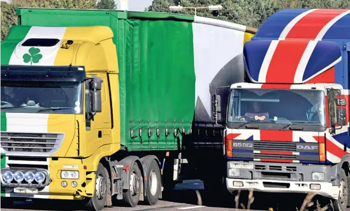  ??  ?? RED LORRY, GREEN LORRY: The form of hard Brexit now apparently in prospect mitigates only the negative impact on North-South trade — and is dwarfed by the potential damage to trade with Great Britain and the disruption to Continenta­l surface transport routes