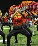  ?? CONTRIBUTE­D ?? The Cincinnati Tradition is one of the drum and bugle corps groups that will be performing at the Summer Music Games in Mason on Wednesday.