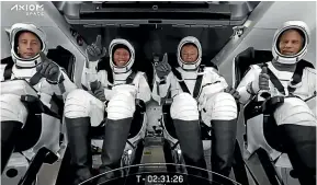  ?? AP ?? The SpaceX crew in the Dragon spacecraft at Cape Canaveral, Florida. SpaceX launched three rich businessme­n and their astronaut escort to the Internatio­nal Space Station (ISS) for more than a week’s stay.