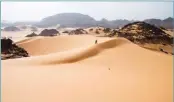  ??  ?? UPI Soft sand dunes in Tadrart Acacus, in western Libya, are part of the Sahara Dedert in Africa. Researcher­s have determined the Sahara Desert has grown about 10 percent in nearly 100 years.