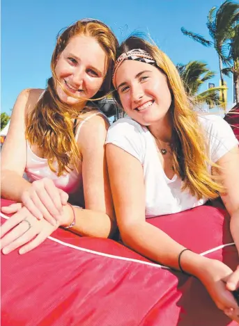  ?? Picture: FIONA HARDING ?? RIGHT AT HOME: Newly arrived from Venezuela, the Klein sisters Stefi, 19, and Tania, 16, soaked up the National Youth Week beach party celebratio­ns on The Strand.