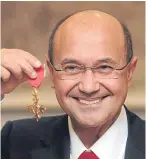  ??  ?? Toni Mascolo with his OBE for services to hairdressi­ng.