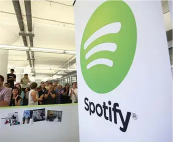  ?? MARIO TAMA/GETTY IMAGES FILE PHOTO ?? Record industry sales have increased thanks to legions of consumers paying to listen on Spotify and Apple Music.