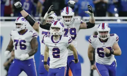  ?? ?? Teammates react after Buffalo Bills kicker Tyler Bass hits a 45-yard game winning field goal. Photograph: Duane Burleson/AP