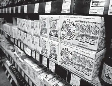  ?? TERRENCE ANTONIO JAMES/CHICAGO TRIBUNE 2018 ?? Hard seltzer, including the wildly popular White Claw, is projected to top $1 billion in sales by the end of the year.