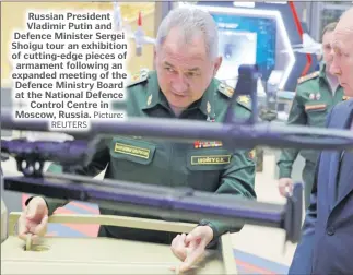  ?? Picture:
REUTERS ?? Russian President Vladimir Putin and Defence Minister Sergei Shoigu tour an exhibition of cutting-edge pieces of armament following an expanded meeting of the Defence Ministry Board at the National Defence Control Centre in Moscow, Russia.