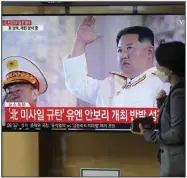  ?? (AP/Lee Jin-man) ?? A TV screen showing a news program reporting about North Korea’s missile launch Thursday with file footage of North Korean leader Kim Jong Un, is seen at the Seoul Railway Station in Seoul, South Korea.