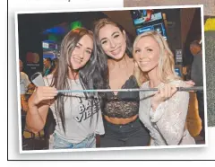 ?? Pictures: REGINA KING ?? Elizabeth Miller gets into the swing of things at the opening of Topgolf in Oxenford last night. Left: Madi Weston, Danni Belle and Hannah Polites.