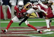  ?? AP PHOTO ?? Arizona Cardinals wide receiver J.J. Nelson (14) makes a touchdown catch as Washington Redskins cornerback Quinton Dunbar (47) defends.