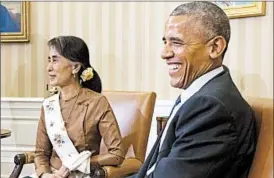  ?? MICHAEL REYNOLDS/EPA ?? Aung San Suu Kyi and President Barack Obama chat Wednesday in the Oval Office.