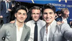  ?? ?? It’s an honour: Pinto (right) and his brother taking a photo with Macron in bangkok. — Photo from Pinto’s Instagram page