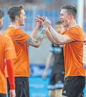 ??  ?? HAPPY HITMAN: Craig Cormack, right, celebrates after making it 2-0 for Rothes against Brora Rangers at Mackessack Park last night