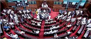  ?? Opposition members protest during the budget session of Rajya Sabha in New Delhi. — PTI ??