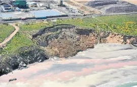  ??  ?? DAMAGING: Tormin mine denies causing the collapse of this cliff