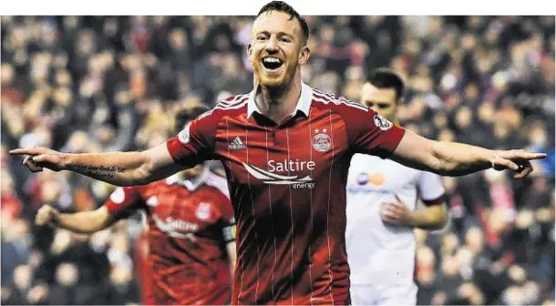  ??  ?? SWEET 16: Adam Rooney celebrates his hat-trick goal against Motherwell on Wednesday night, which took his tally for the season to 16