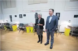  ?? JONATHAN HAYWARD, THE CANADIAN PRESS ?? Federal Health Minister Patty Hajdu and Vancouver Mayor Kennedy Stewart speak to the media during a visit to the Molson Overdose Prevention Site in Vancouver’s Downtown Eastside on Thursday. Councillor­s in Vancouver have voted to request the federal government decriminal­ize possession of small amounts of illicit drugs.