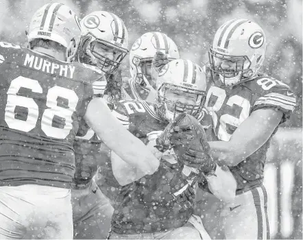  ?? Brett Coomer / Houston Chronicle ?? Green Bay fullback Aaron Ripkowski (22) celebrates his 3-yard touchdown run against the Texans during the final minutes of the fourth quarter at Lambeau Field. The score put the Packers up 21-7, capping an eight-play, 89-yard drive.