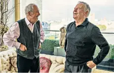  ??  ?? Inside track: Gyles, left, reminisces with Jeffrey Archer, his former athletics coach