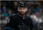  ?? NHAT V. MEYER — BAY AREA NEWS GROUP ?? The Sharks’ Andrew Cogliano (11) stands on the ice during their game against the Montreal Canadiens in the third period at the SAP Center in San Jose on Thursday.