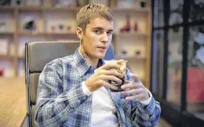  ?? CNW GROUP ■ TIM HORTONS ?? The next collaborat­ion between pop star Justin Bieber and Tim Hortons is a French vanillafla­voured cold brew coffee.