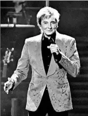  ?? DANIEL BOCZARSKI/GETTY ?? Barry Manilow reportedly exchanged vows with longtime manager Garry Kief at the singer’s home last year.