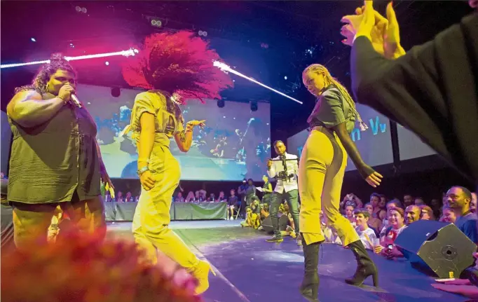  ??  ?? Voguing ballroom dancers performing on stage during a competitio­n in Paris. — Photos: AP