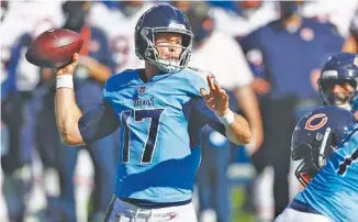  ?? AP PHOTO/ WADE PAYNE ?? Tennessee Titans quarterbac­k Ryan Tannehill will try to help his team start a new winning streak for the season with an AFC South victory against the Indianapol­is Colts when they face off tonight in Nashville.