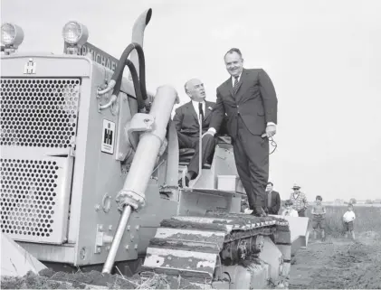  ??  ?? 0 The first sod of earth is cut at Livingston in 1964. New towns had been opposed by the Tories after the war