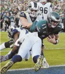  ?? AP PHOTO ?? END OF THE LINE: The Eagles’ Carson Wentz takes a potentiall­y season-ending hit yesterday in Los Angeles.