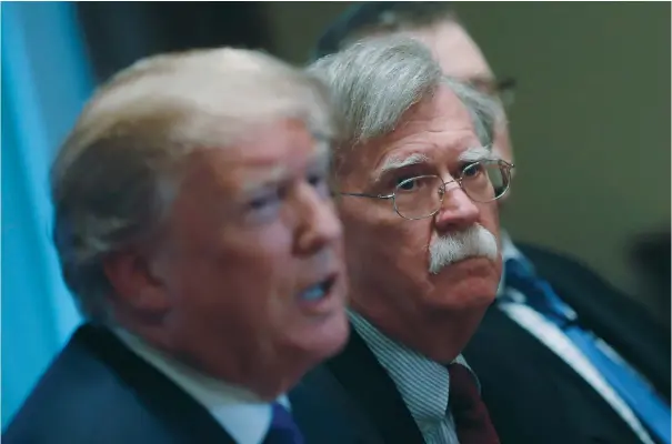  ?? (Carlos Barria/Reuters) ?? US PRESIDENT Donald Trump receives a briefing from senior military leadership accompanie­d by his new National Security Adviser John Bolton in the White House last week.