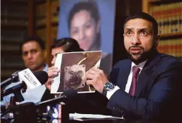  ??  ?? Attorney Mo Aziz displays a photo of the detonated airbag part at a news conference Wednesday. When the airbag deployed, a metal shard inside struck Huma Hanif ’s neck, fatally wounding the 17-year-old.