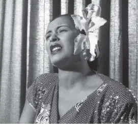  ?? Hulton Archive/Getty Images/TNS ?? American blues singer Billie Holiday performs in the early 1950s.