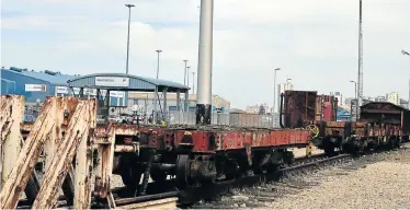  ?? Picture: EUGENE COETZEE ?? BACK ON TRACK: Transnet is working on reviving SA’s rail network, including in Port Elizabeth harbour, shown here