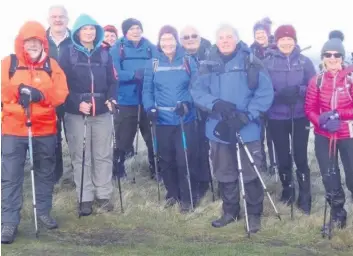  ??  ?? Happy hikers Our Lady of Lourdes club members stop for a breather