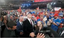 ?? MICHAEL AINSWORTH — THE ASSOCIATED PRESS FILE ?? In this file photo, Wyoming’s Josh Allen, center, takes a selfie of himself with Buffalo Bills fans after being selected by the team during the first round of the NFL football draft, in Arlington, Texas. It has never been easy being a sports fan in...