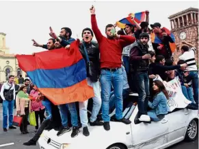  ??  ?? Loud and clear: Armenians demonstrat­ing in Yerevan against Sarkisian’s election as prime minister. — AFP