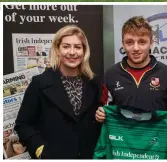  ??  ?? Arlene Regan and Chris Davies present Diarmuid Codyre with his jersey