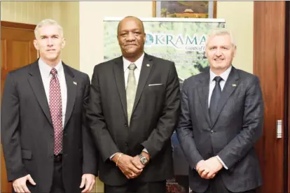  ?? (Ministry of the Presidency photo) ?? From left are Country Manager of ExxonMobil Guyana, Rod Henson; Minister of State, Joseph Harmon and Executive Vice President at Exxon Mobil Exploratio­n Corporatio­n, Mike Cousins.