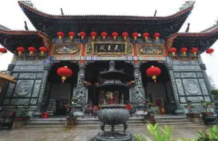  ??  ?? The 125-year-old Kuan Yin or Goddess of Mercy Temple in Jalan Raya Barat will see devotees offering roast meats, cakes, fruits, joss sticks and paper sculptures on Sunday.