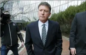  ?? MICHAEL DWYER — THE ASSOCIATED PRESS FILE ?? In this file photo, Bruce Isackson departs federal court in Boston after facing charges in a nationwide college admissions bribery scandal.