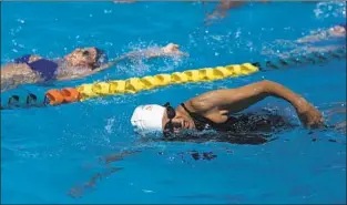  ??  ?? KORNFELD WARMS UP before racing at the U.S. Masters Swimming nationals this April in Mesa, Ariz. Head referee Teri White said she was “the star of the meet.”