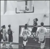  ??  ?? LET IT FLY
Desert Christian’s Isaiah Diaz, jumping, throws up a basket against Lancaster Baptist on the road on Friday. The Knights won 76-24.
JOHN SANDERS Valley Press Sports Correspond­ent