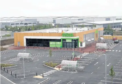  ??  ?? > The Asda store at Warth Park in Northampts­onshire