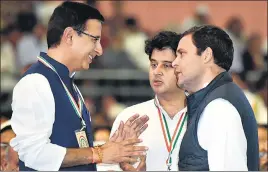  ?? MOHD ZAKIR/HT PHOTO ?? (From left) Congress leaders Randeep Singh Surjewala and Jyotiradit­ya Scindia with party president Rahul Gandhi at the grand old party’s plenary session in New Delhi on Saturday.