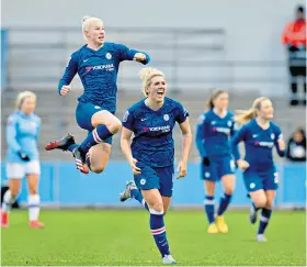  ??  ?? Piledriver: Beth England (left) celebrates her stunning goal for Chelsea