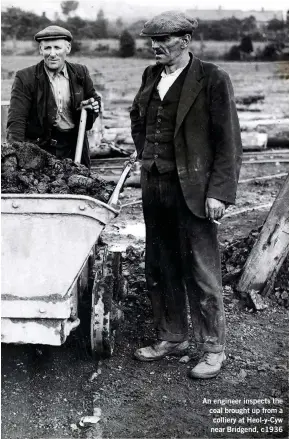  ??  ?? An engineer inspects the coal brought up from a colliery at Heol-y-Cyw near Bridgend, c1936