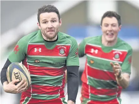  ??  ?? Pwllheli’s double try scorer Deio Brunelli