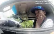  ?? AP/FILE ?? A photo taken by a body camera June 9 shows tennis star Venus Williams listening to Palm Beach Gardens Police Officer David Dowling after the crash.