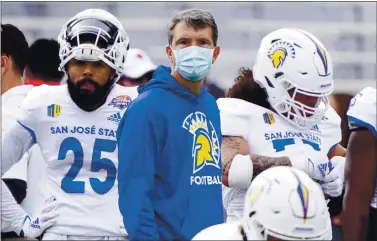  ?? RICK SCUTERI — THE ASSOCIATED PRESS ?? San Jose State head coach Brent Brennan in the first half of the Arizona Bowl NCAA college football game against Ball State on Dec. 31 in Tucson, Ariz.