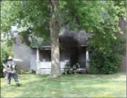  ?? PHOTO COURTESY OF ETHAN BANSEK ?? Lorain firefighte­rs battled a house fire at a residence in the 2000block of Oberlin Avenue on June 17.